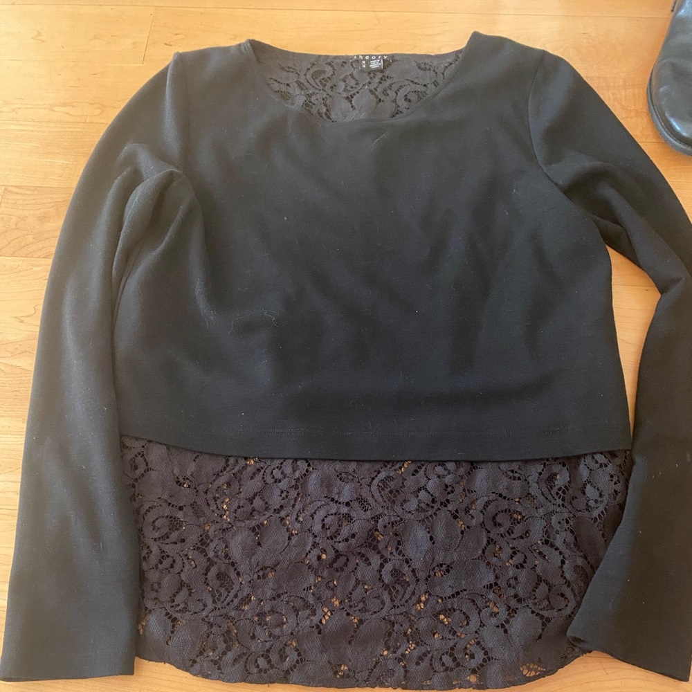Theory long sleeve black top with lace bottom. Looks great with black leggings